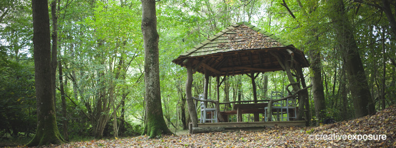 Wedding photographers in kent at the secret woodland wedding venue the paper mill in Hawkhurst